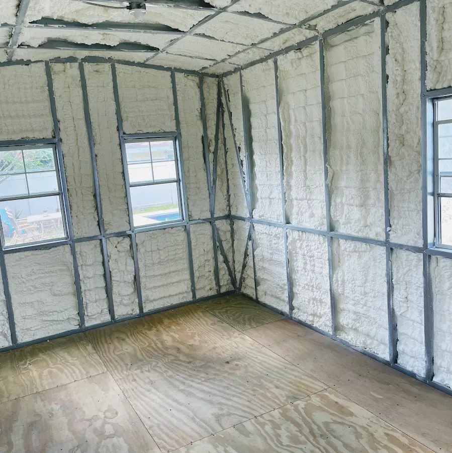 Closed-cell spray foam insulation applied to wall cavities in a residential project in Valrico